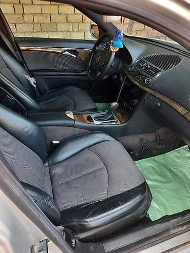 masin salonlari: Mercedes-Benz E‑Class (W211) — 2