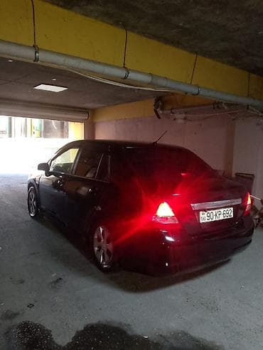 sprinter satisi: Nissan Tiida: 1.6 l | 2006 il Sedan — 2