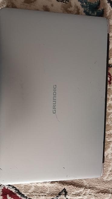 Grundig GNB 1550 B1 Series noutbuk.Zaryadka saxlayir 2 saat.Korpusda
