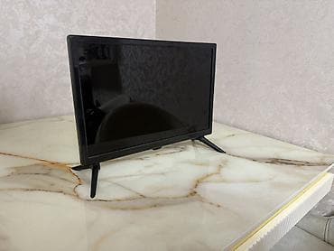 2.5mm kabel: Qara rəngli, kompakt ölçülü televizor. Model masaüstü istifadə üçün — 1