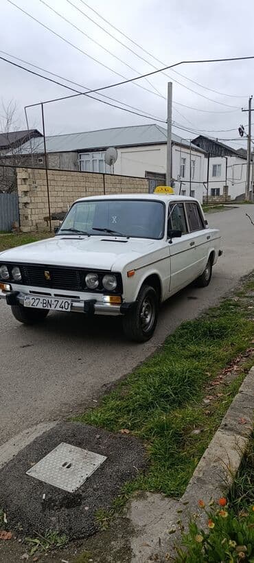 ваз 2111: VAZ 2106, ağ rəng, sedan kuzov. Klassik “Jiquli” znaki. ij təkərlər — 5