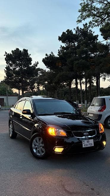 moped 49 kub: Kia Rio: 1.4 l | 2010 il Sedan — 4