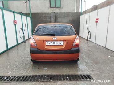 Digər nəqliyyat: Kia Rio hatchback - Kuzov: 5 qapılı hatchback, narıncı rəng - — 1