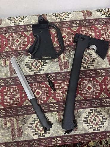 Balta cantasi caxmaqi arxasinda sapina yerlesdirilen bicaq. Dubinka