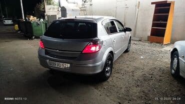 daewoo gentra necə maşındır: Opel Astra H – 5 qapılı hetçbek, gümüşü rəng. - Nömrə: 99 VU 521 - — 6