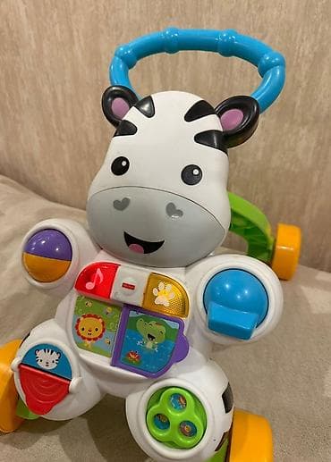 celik: Fisher-Price zebra formalı uşaq gəzdiricisi və interaktiv fəaliyyət — 1