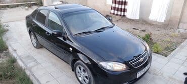 lada kalina 2011: Chevrolet Lacetti: 0.6 l | 2022 il 60000 km Sedan — 7