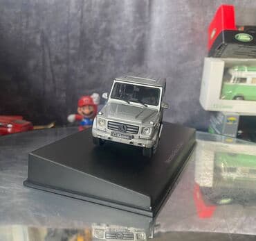 metbex tavan modelleri: Коллекционная модель Mercedes-Benz G-class W463 silver 2012 AutoArt — 11