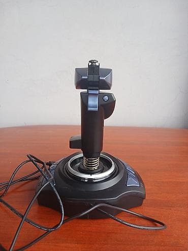Digər oyun və konsollar: Genius MaxFighter F-31U Vibration Joystick modelidir. Əsasən uçuş — 4