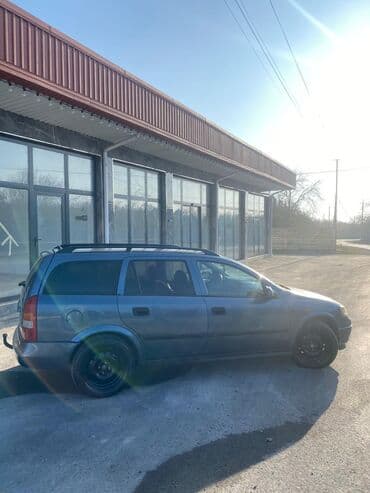 oka satılır: Model: Opel Astra Caravan (universal kuzov) Rəng: tünd boz Yanacaq — 12