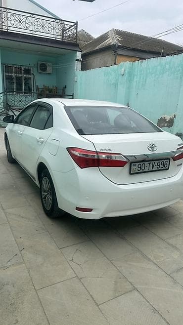 e class: Toyota Corolla: 1.6 l | 2015 il Sedan — 2