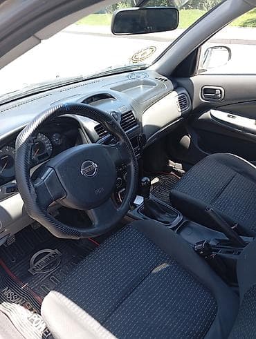 Nissan Sunny: 1.6 l | 2008 il Sedan — 5