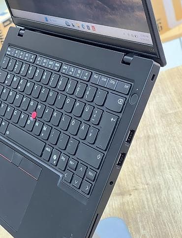 xarab notebook: Lenovo ThinkPad, 14 ", AMD Ryzen 7, 1 TB — 3