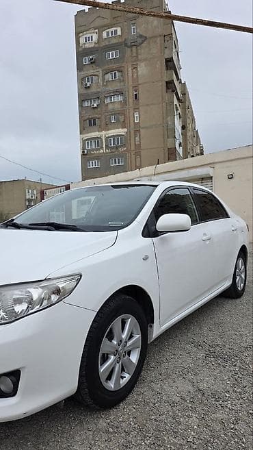 annaite teker: Toyota Corolla XLE/LE sedan – ağ rəng, 4 qapılı, ön/yan aerodinamik — 3