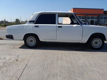 колпаки для дисков: Model: Lada 2107 Kuzov: sedan, 4 qapı Rəng: ağ Nömrə nişanı: 09-BP-635 — 1