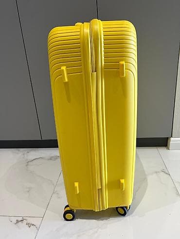 Спортивное питание: Sarı rəngli sərt qabıqlı çamadan səyahət üçün nəzərdə tutulmuşdur — 3