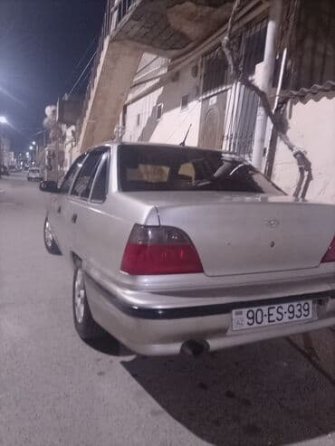 матиз 2 ош: Daewoo Nexia sedan - Kuzov: 4 qapılı sedan, gümüşü rəng - Nömrə — 5
