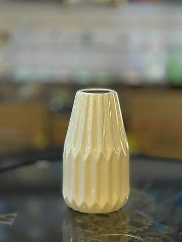 tebii deri: Bir vaza, Keramika — 3