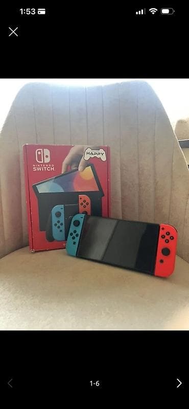 soba aliram: Nintendo Switch (Neon Blue/Neon Red Joy‑Con) – tam paket Ideal — 1