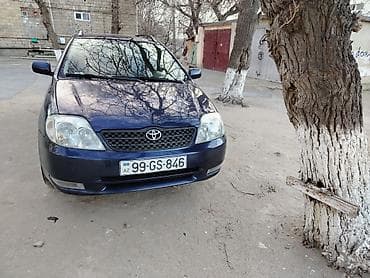 Toyota Corolla wagon/universal, tünd mavi rəng. 5 qapılı, geniş