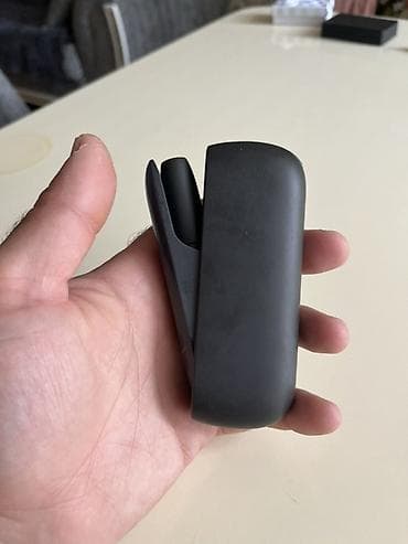 iqos iluma azerbaycan: IQOS 3 DUO heated tobacco cihazı satılır. Şəkillərdə qara rəngli — 1