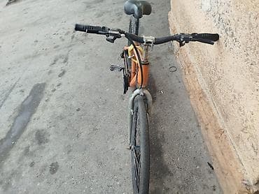 velsebet: Portağal rəngli, qalın təkərli, çoxsürətli velosiped. Metal çərçivəyə — 2