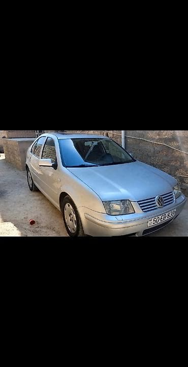 Volkswagen Bora (sedan), gümüşü rəng. - Salon: qara parça oturacaqlar — 4