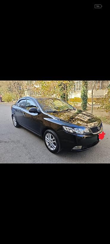 kia k5 2011: Kia Cerato: 1.6 l | 2011 il Sedan — 1