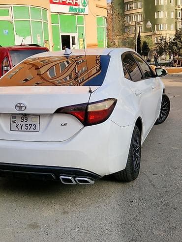 Toyota Corolla, ağ rəng,sedan gövdə. I - Nömrə nişanı: 99-KY-573 — 5