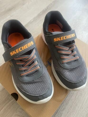 kreditle geyimler: Skechers brendinin uşaq kros keti. Ayaqqabılar tünd boz rəngdədir və — 1