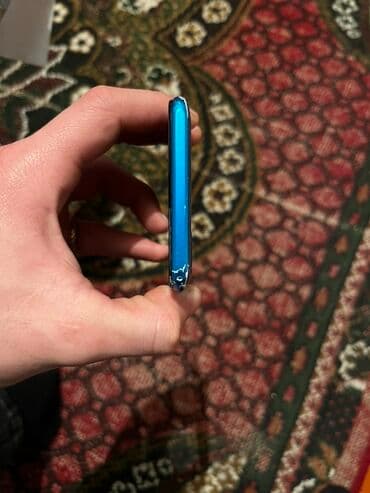 телефон fly iq4504: Tecno Spark, цвет - Голубой, Отпечаток пальца — 5