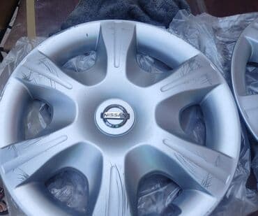 disk kalpaklari: İşlənmiş Kolpak Nissan R 15 — 2