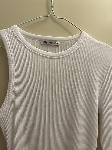 zara hirka: Zara asimetrik kollu tişört 
Az geyilib — 6