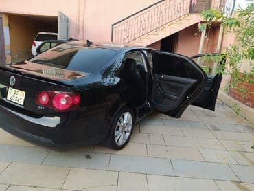 oturucu: Volkswagen Jetta: 2 l | 2009 il Sedan — 1