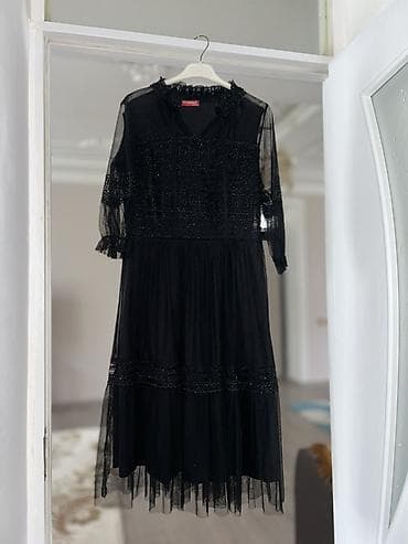 Real alıcıya endirim olunacaq,paltar heç geyinilmiyib Qara rəngli