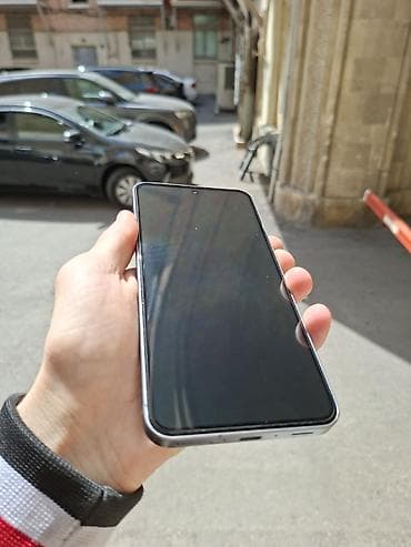 Мобильные телефоны и аксессуары: Samsung Galaxy A56 5G, 128 ГБ, цвет - Серый, Отпечаток пальца, Две SIM карты, Face ID — 6