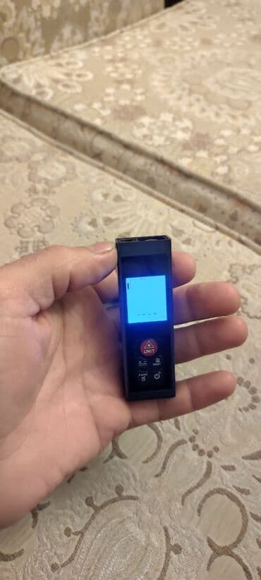 lazer ölçüm cihazı: Lazer Metre Material**: Akrilonitril Butadien Stirol (ABS) 2 — 1