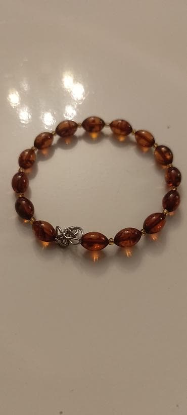 Наручные часы: Təbii Baltik kəhrabasından “Zeytun” formalı bilərzik - Material — 4