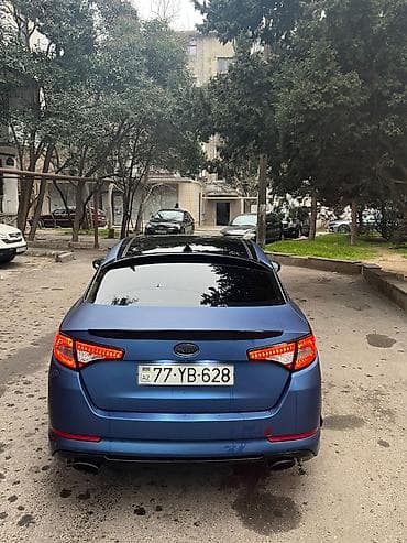 audi q3 2 tdi: Kia Optima: 2 l | 2013 il Sedan — 5