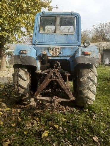 yuk avtomobilleri satisi: Mavi rəngli təkərli traktor Texniki xüsusiyyət və üstünlüklər: - — 2