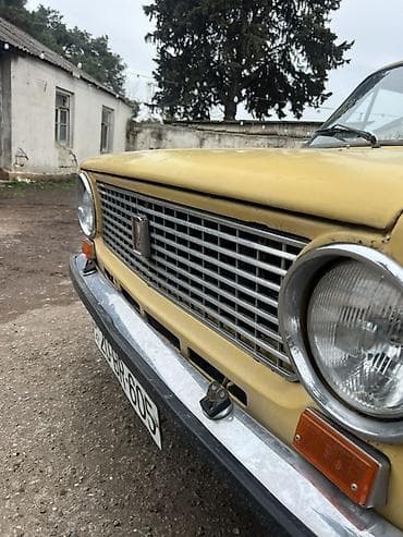 ucuz maşınar: Model: VAZ 2101 “Jiquli” Kuzov: sedan, 4 qapı Rəng: sarı Ön-arkalı — 4