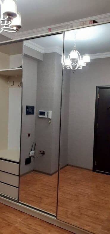 tam temirli menziller: İnşaatçılar metrosunun çıxısında inşaat binasında 12 mertebeli — 2