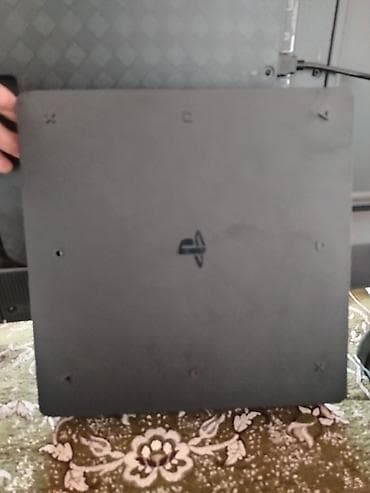 видео камеры: PlayStation 4 Slim konsolu 500gb yaddaş - Daxildir: - 2 ədəd — 8
