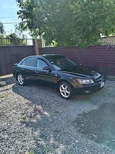 Hyundai Sonata sedan - Korpus: 4 qapılı, qara rəng - Salon: tünd