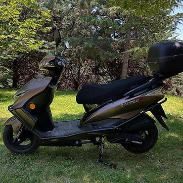 moto kavasaki: Skuter – QUANTUM C8S (benzinli) Xüsusiyyətlər: - Aqressiv dizaynlı ön — 5