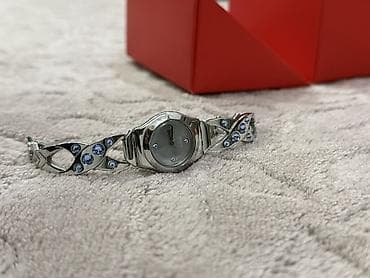 saat ev: Yeni, Qol saatı, Swatch — 2