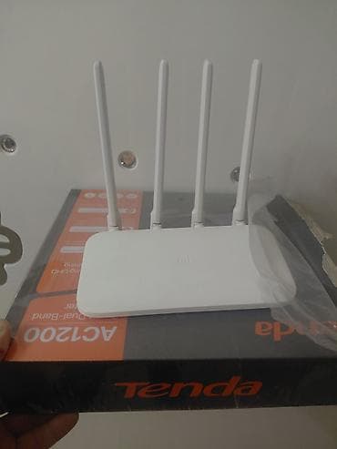 Tenda AC1200 ikizolaqlı (dual-band) Wi‑Fi router Xüsusiyyətlər: - 2.4 lalafo.az -da Tenda AC1200 ikizolaqlı (dual-band) Wi‑Fi router Xüsusiyyətlər: - 2.4
