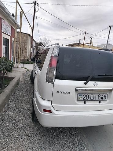 elektrik moto: Nissan X-Trail (T30) – ağ rəngli, 5 yerlik SUV Xüsusiyyətlər: - — 8