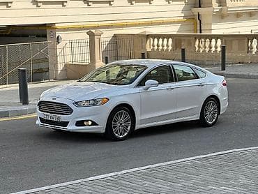 dinamo ford focus: Ford Fusion sedan – ağ rəng, 4 qapı, ön ötürücülü. Xüsusiyyətlər: - — 4
