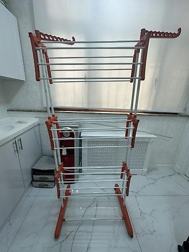 Qatlanıb-açıla bilən paltarqurudan asılqan - Material: möhkəm metal